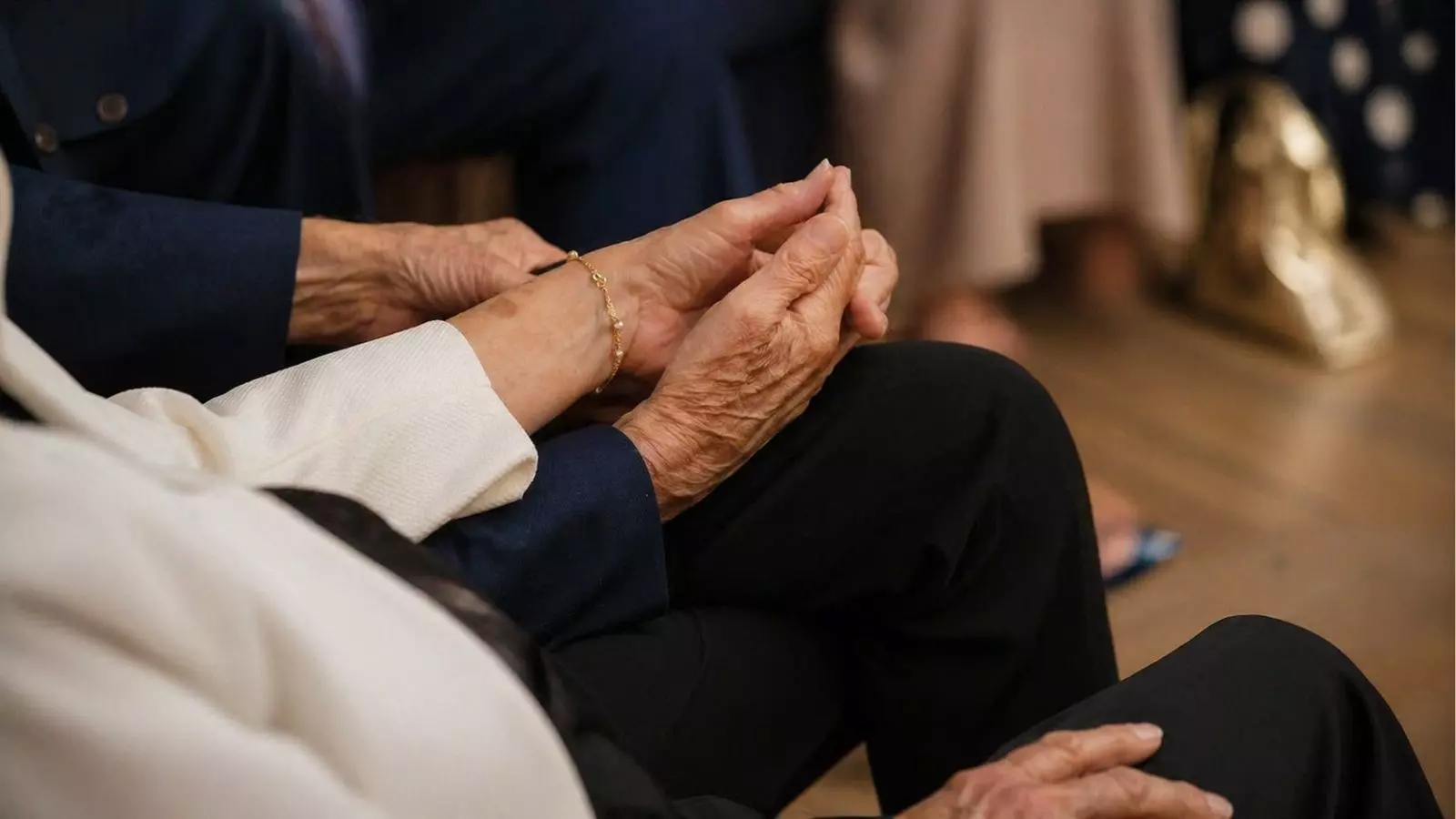 emotional moment vow renewal ceremony hands
