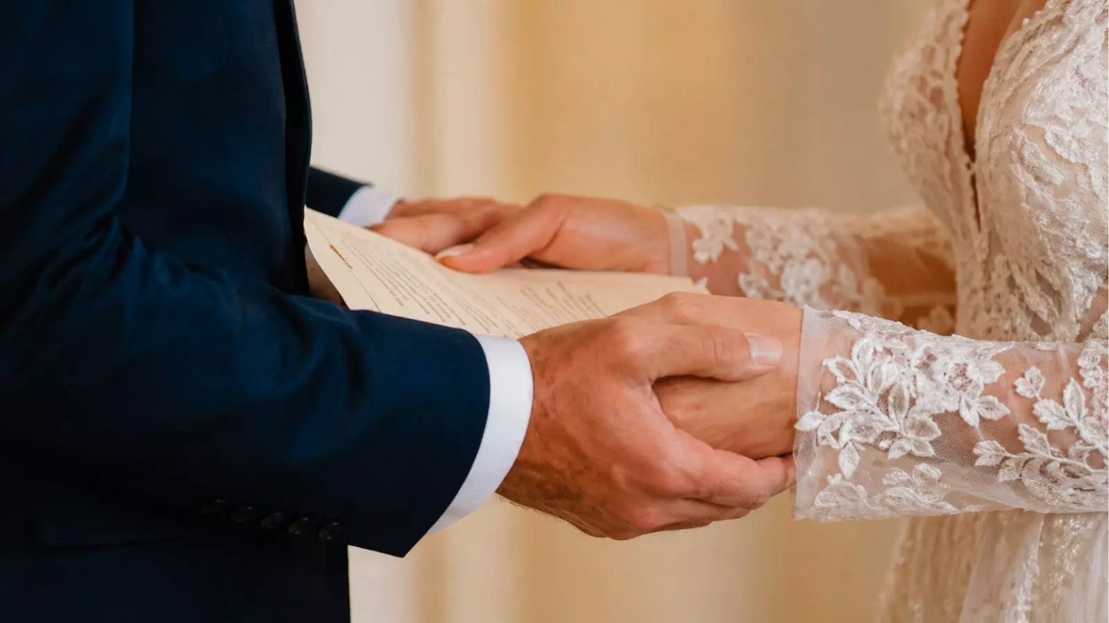 holding hands wedding vows