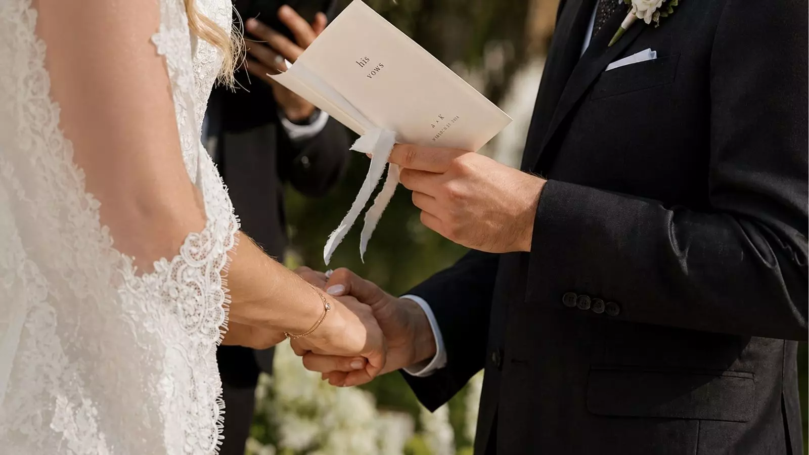 holding hands during wedding vows