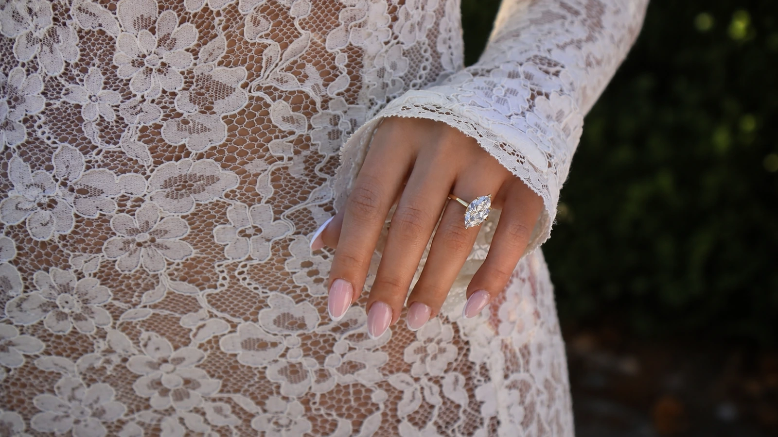 soft pink fall wedding nails with lace bridal dress