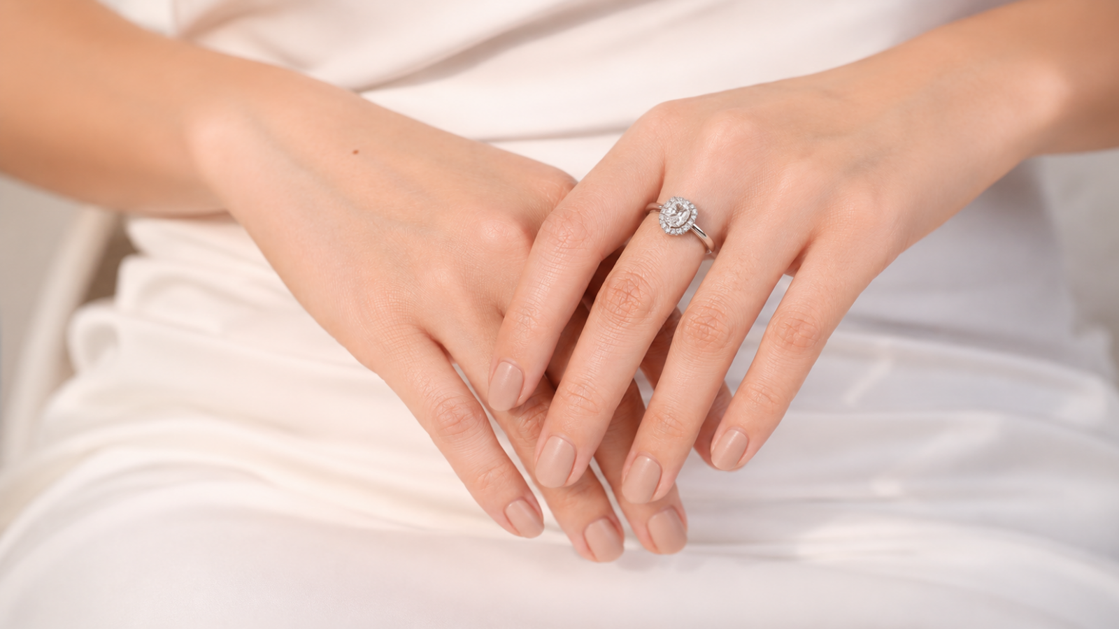 Short minimal nude wedding nails with bridal jewelry