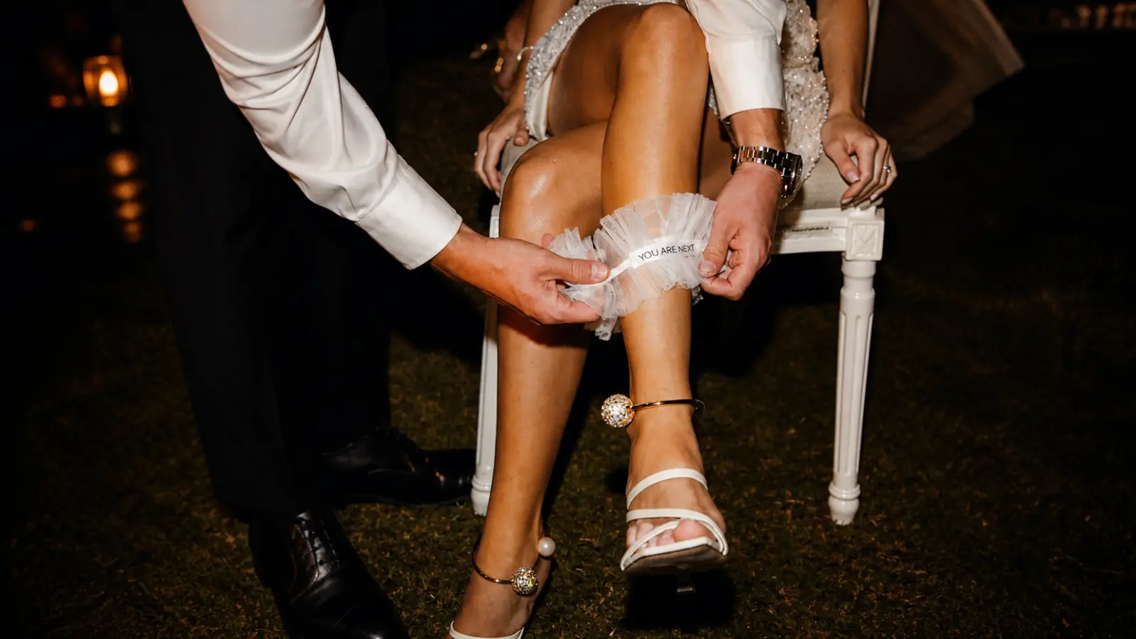 wedding Garter Toss Songs removal bride reception tradition