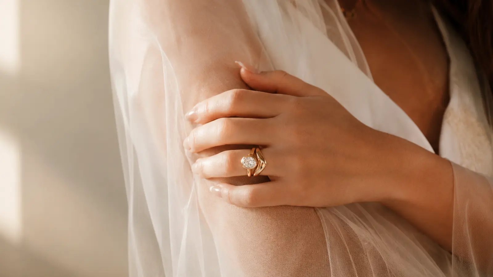 Close-up of a wedding ring worn during an everyday moment, representing daily wedding ring care and wearing habits.