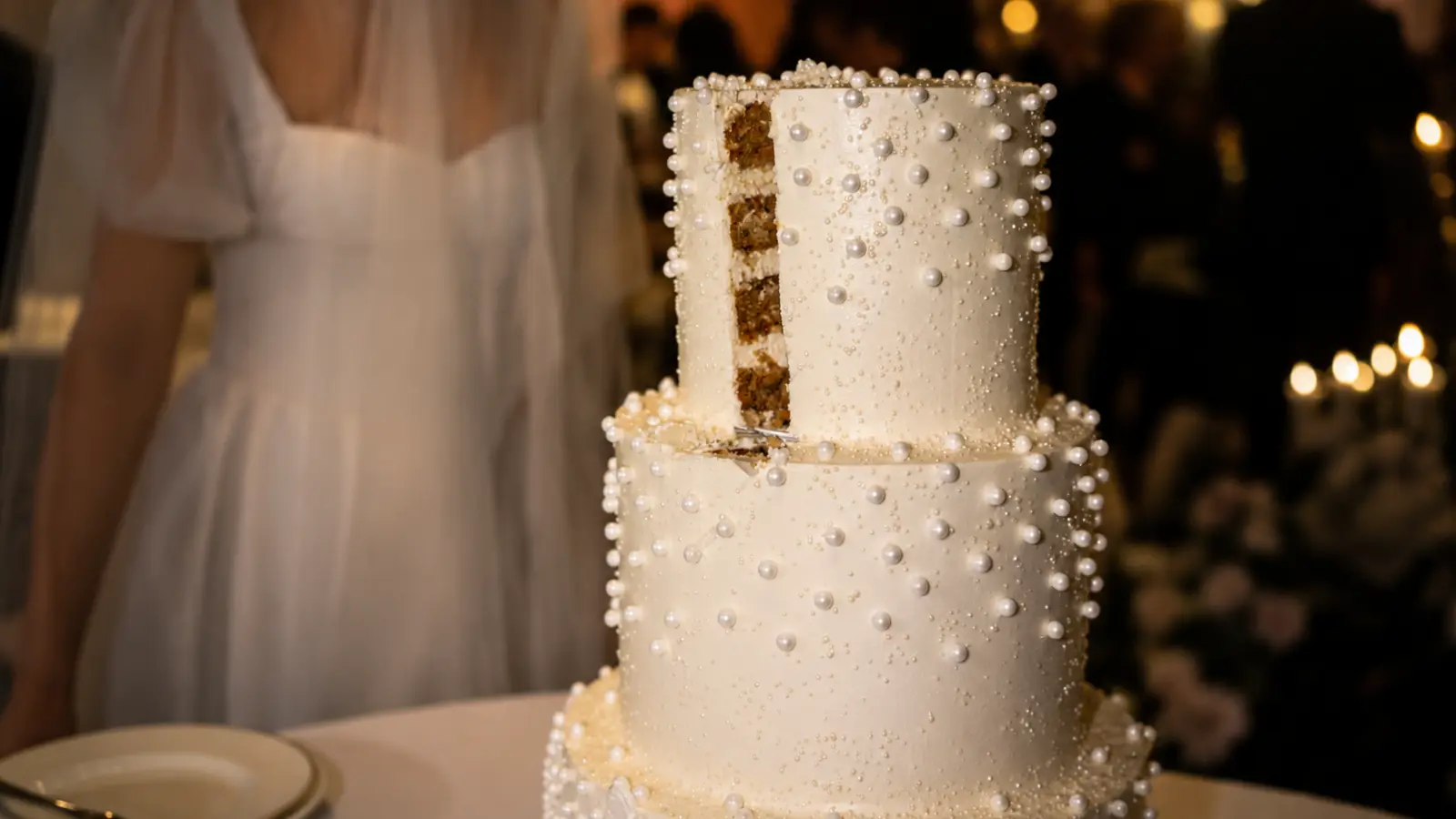 Elegant pearl wedding cake with sophisticated white decoration