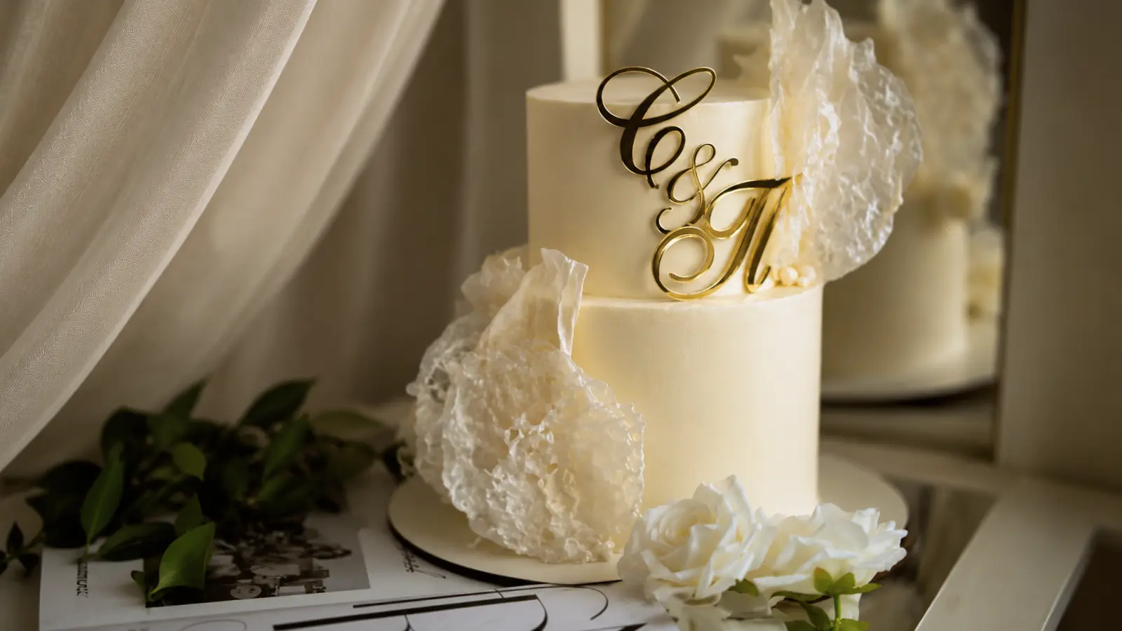 Gold initial wedding cake topper