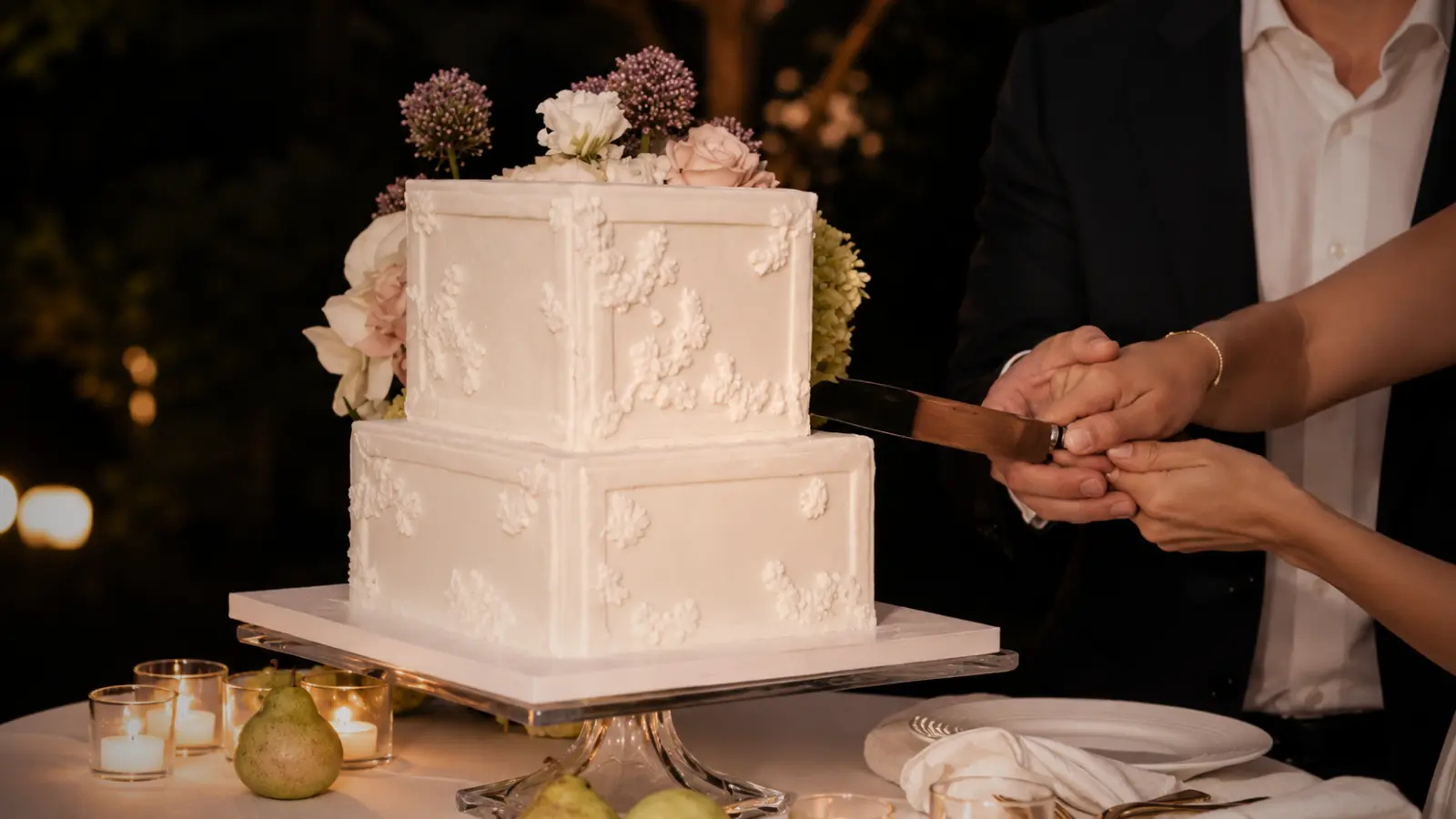 Modern square wedding cake with clean minimalist white design