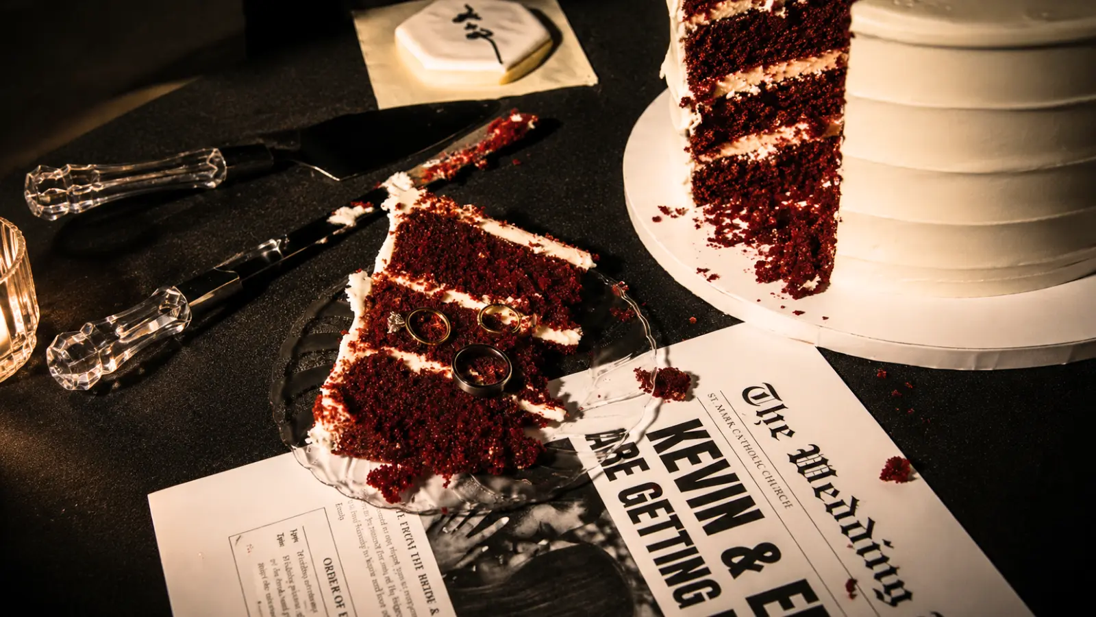 Red velvet wedding cake slice with cream filling