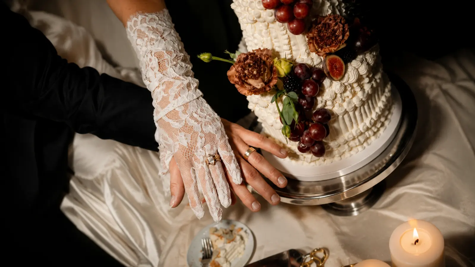 Simple white wedding cake with elegant buttercream details and timeless design
