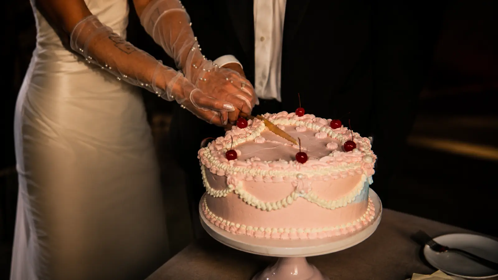 Vintage wedding cakes with cherries and retro decorations