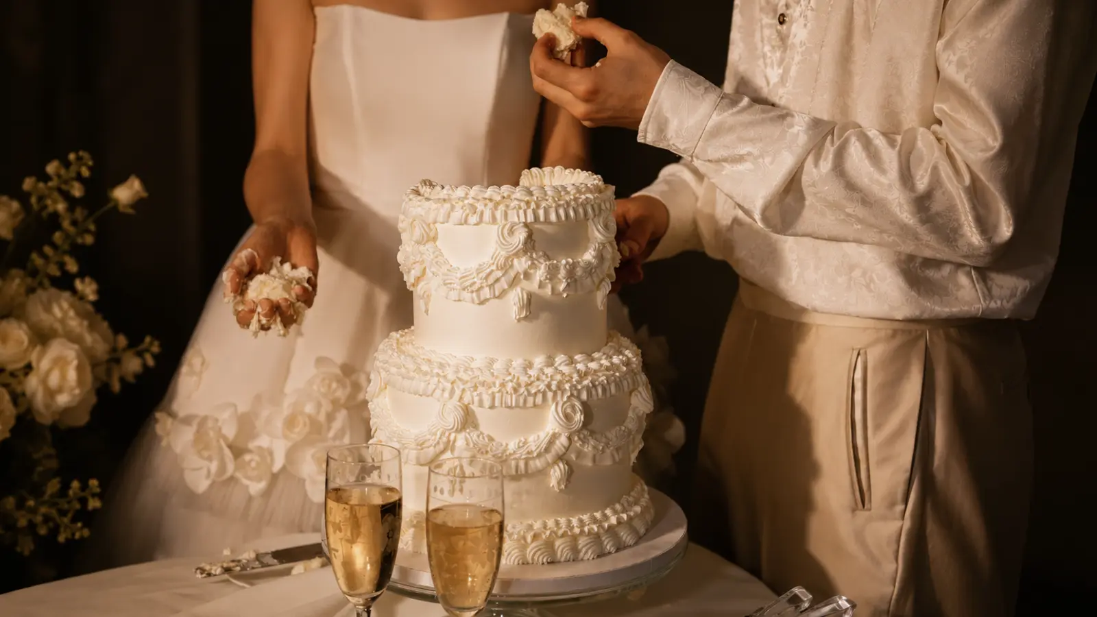 Vintage white Lambeth wedding cake with classic piping details