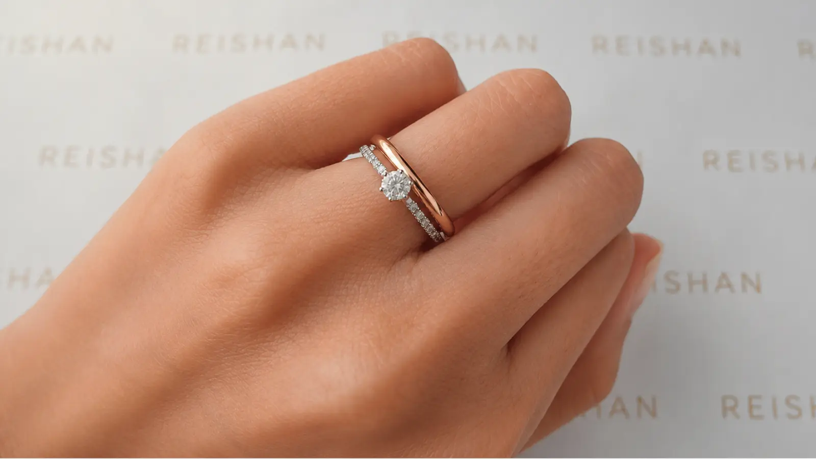 Rose gold engagement ring paired with a matching wedding band
