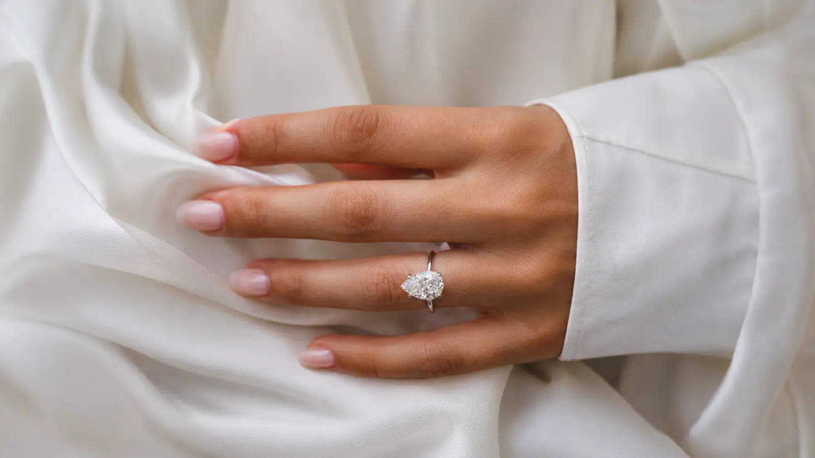 Wedding Bands for Pear Shaped Engagement Rings: How to Find the Right Fit