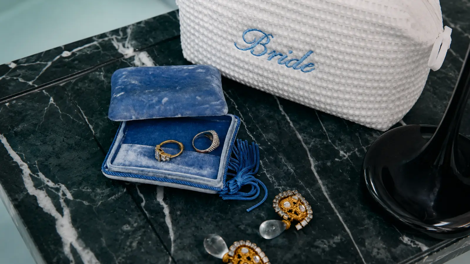 Original wedding rings stored safely inside a travel jewelry case during a trip