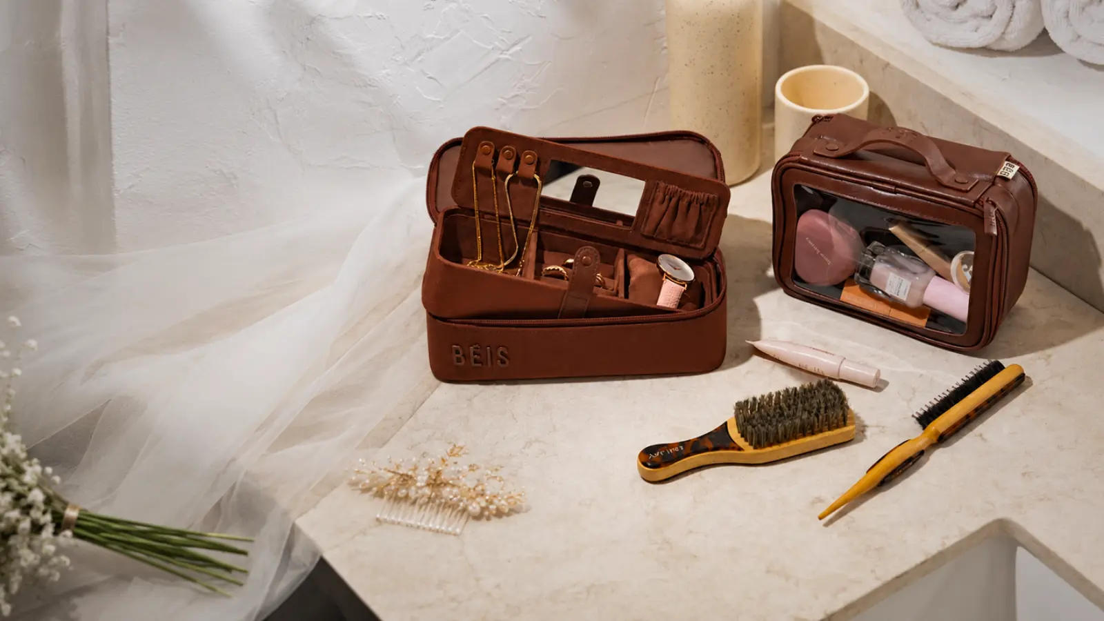 Wedding emergency kit with beauty products and bridal essentials on a vanity