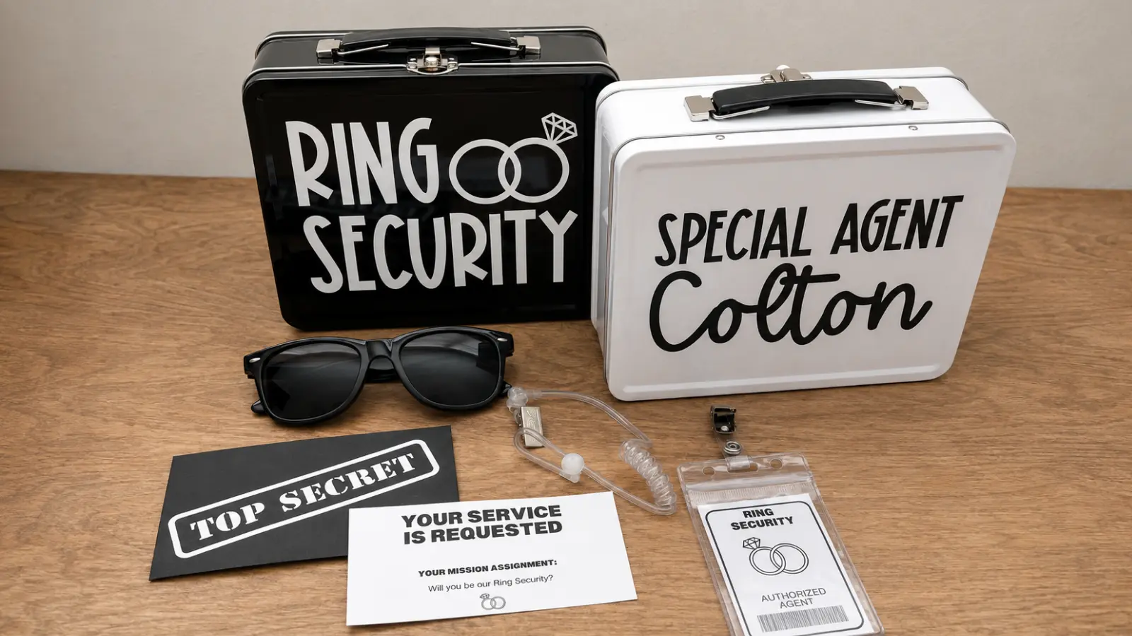 Ring Security gift kit with personalized cases, sunglasses, mission card and agent badge arranged as a fun ring bearer proposal idea Ring Bearer Proposal and Gifts