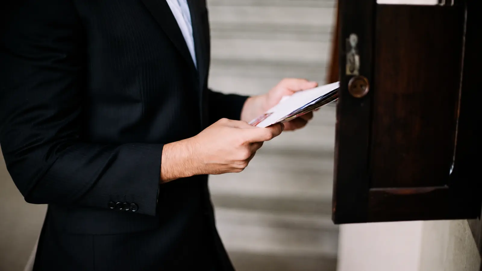 Wedding officiant reviewing official documents, representing legal authority, registration requirements and credentials needed to perform a marriage ceremony Wedding Officiant License