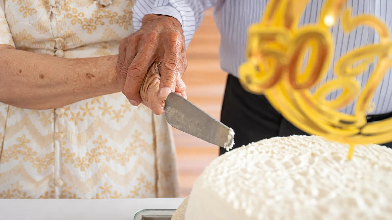 Couple celebrating a golden wedding anniversary together