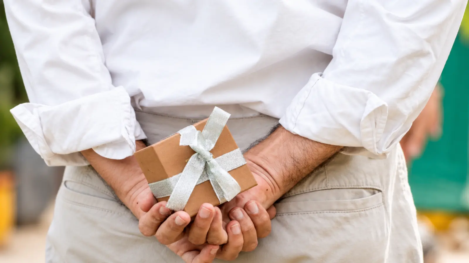 Older married couple holding hands, illustrating lasting marriage and the meaningful wedding anniversary gifts and traditions associated with milestone years