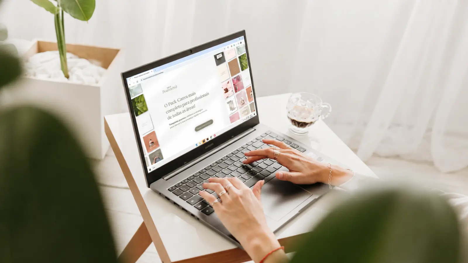 Bride using a laptop while working through wedding planning details