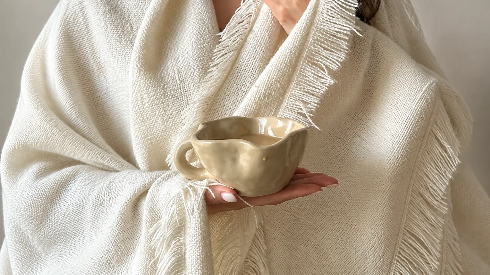Ivory-colored handmade pottery as an ethical 14th wedding anniversary gift idea